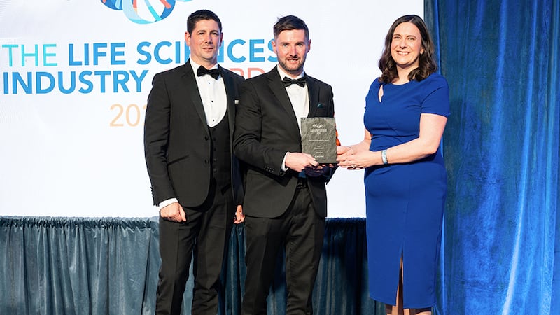 Alan O Riordan, manager at ACCPRO, presents the operational excellence award to Deirdre Connaughton and Paul Keogh, Takeda Ireland