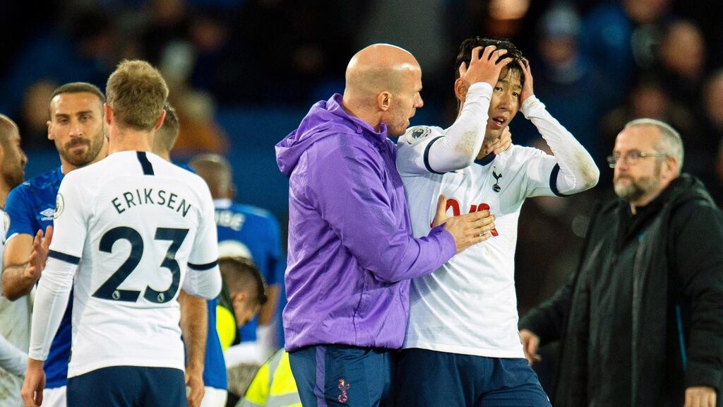 Tottenham Hotspur’s Son Heung-min reacts after tackling Everton’s Andre Gomes during the Premier League game at Goodison Park. Photograph: Peter Powell/EPA