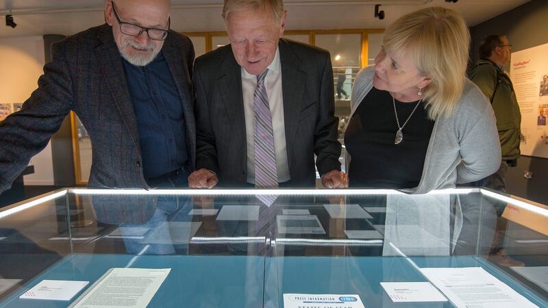 At an exhibition to celebrate the career of investigative journalist Mary Raftery were her husband David Waddell, with Sheila Ahern, who worked on States of Fear, and Roddy Doyle, who spoke at the launch. Photograph: Dave Meehan