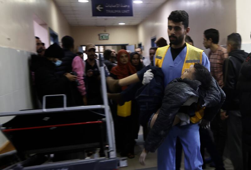 Palestinians wounded in Israeli air strikes arrive at Nasser hospital. Photograph: Mohammed Dahman/AP