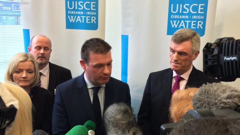 Minister for Agriculture Alan Kelly (centre) and Irish Water managing director John Tierney (right) talk to reporters at the utility’s headquarters in Dublin today. Photograph: Cyril Byrne/The Irish Times