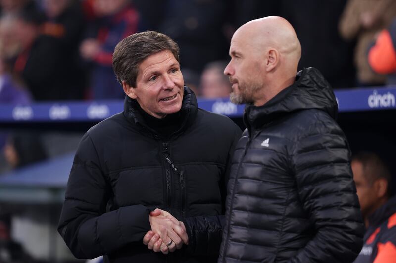 Crstal Palace manager Oliver Glasner shakes shakes hands with Erik ten Hag. Photograph: Alex Pantling/Getty Images