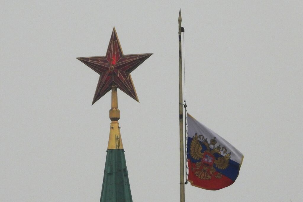 TOPSHOT - The Standard of the President of the Russian Federation flutters at half-mast on top of the dome of the Senate Palace as Russia observes a national day of mourning after a massacre in the Crocus City Hall that killed more than 130 people. (Photo: Getty Images)