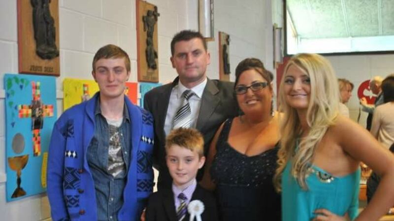 The Reck family: Thomas (left), husband Paul, the late Catherine,  Grace (right) and Shane (front), in the last family photo they have together. File photograph: Paul Reck