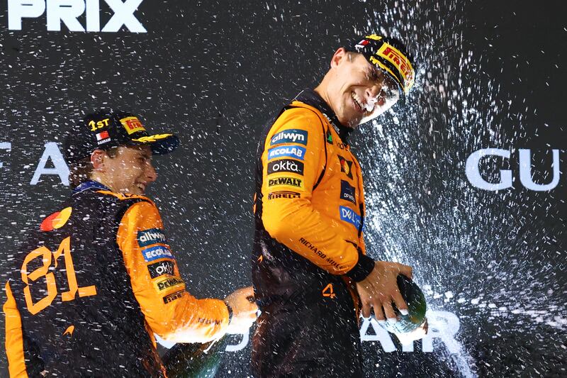 Race winner Oscar Piastri and third-placed Lando Norris celebrate on the podium after the Bahrain Grand Prix on Sunday. Photograph: Clive Rose/Getty Images