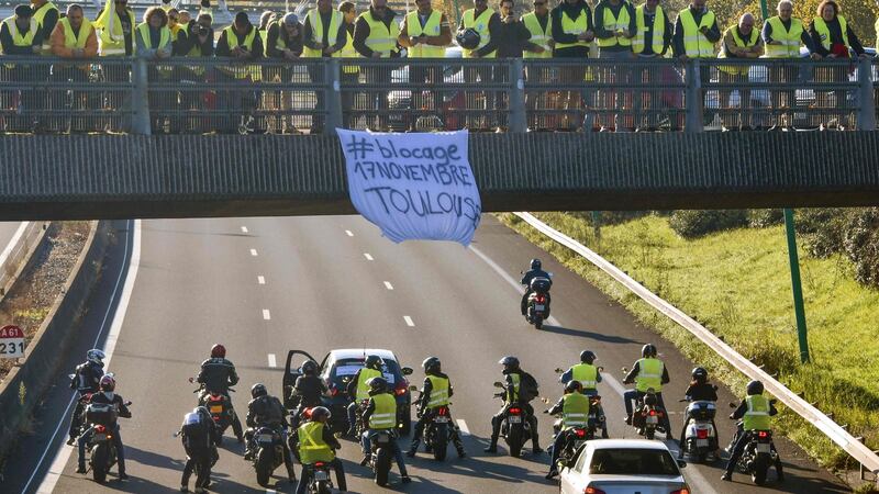 Yellow vest demonstrators  block the road in Toulouse, southern France. Photograph: Paschal Pavini/AFP/Getty Images