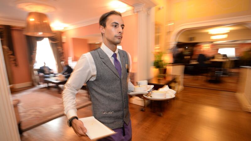 Alvaro Cambronero, from Madrid, in the restaurant at Buswells Hotel, where he is helping train in Elaine from Brazil and Suhel from Mumbai in India. Photograph:   Dara Mac Donaill