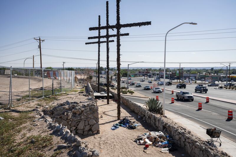 A homeless camp beneath the three crosses that give Las Cruces, New Mexico, its name. Photograph: Justin Hamel/The New York Times
                      