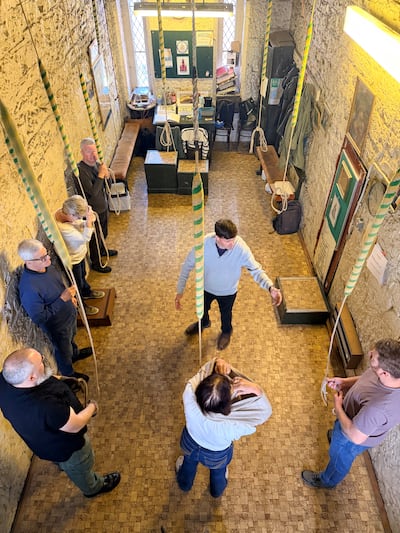 Michael Ryan and bell ringers at St Augustine and St John's Church on Thomas Street