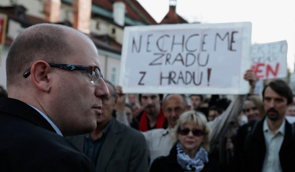Czech Social Democrats leader Bohuslav Sobotka  arrives at a protest rally held by his supporters in front of  Prague Castle  on Monday. The Social Democrats’ leadership body voted 20-13 to call on Mr Sobotka to quit, but he has  vowed to fight on.  Photograph: David W Cerny/Reuters