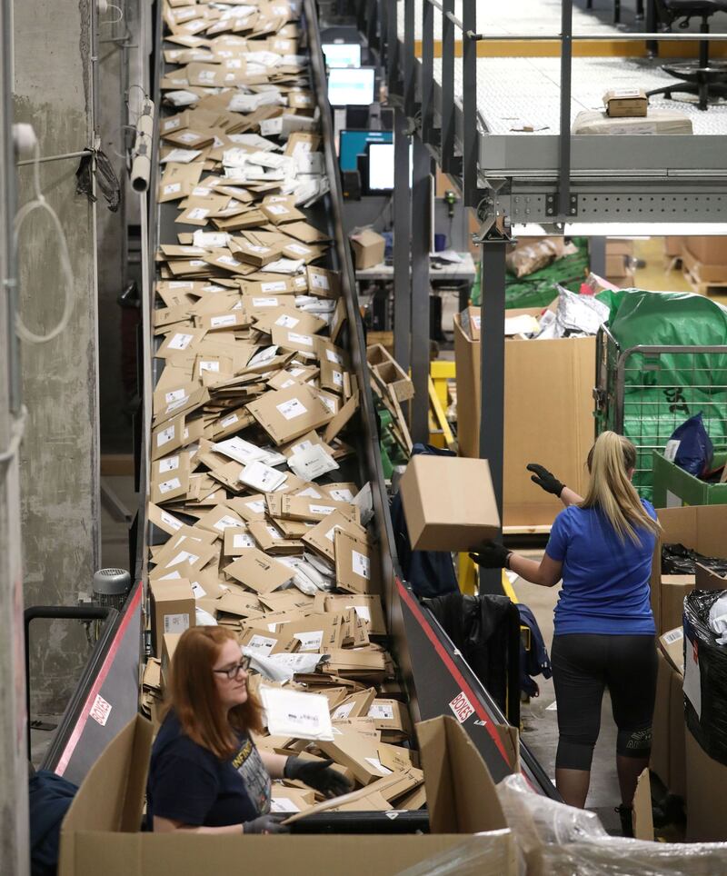 Work continues road the clock at An Post’s parcel hub. Photograph: Crispin Rodwell