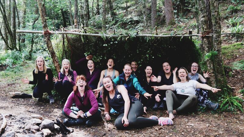 After three hours of sweaty work, the Galz Gone Wild group   admire the leafy bedding they had created beside the camp fire. Photograph: Melissa McDermott
