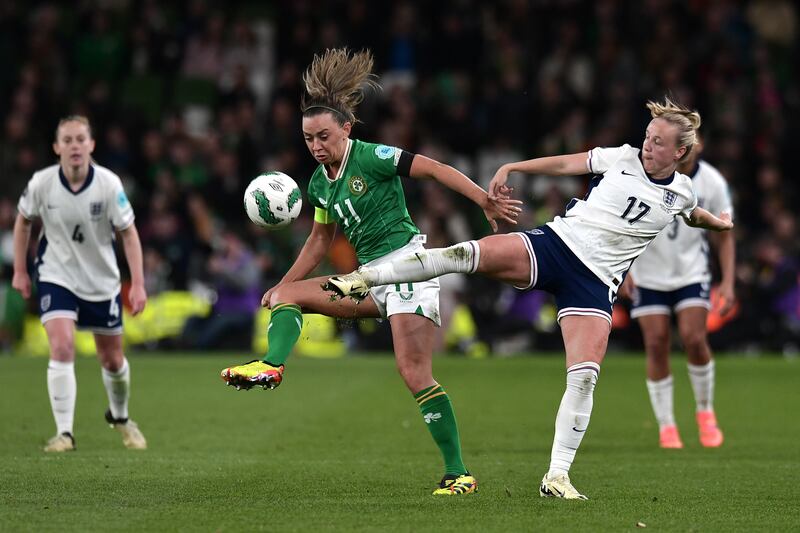 Katie McCabe of the Republic of Ireland under pressure from Beth Mead of England during the UEFA Women's European Qualifier match at Aviva Stadium on Tuesday. Photograph: Getty 