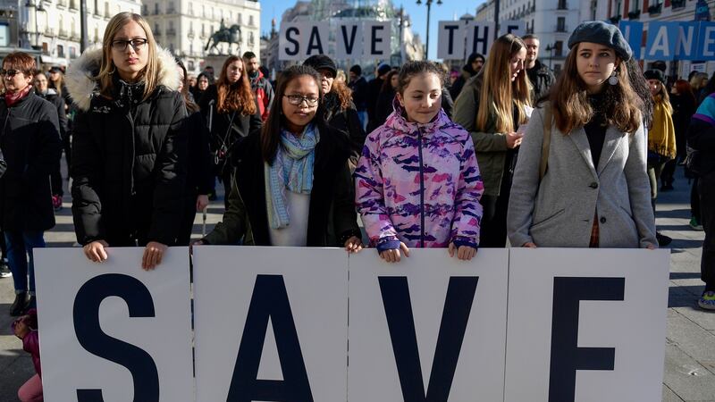 Young demonstrators hold placards   at La Puerta Del Sol in Madrid on Saturday during a protest called by Animal Equality (Animal Igualdad), an international non-profit animal rights organisation, to denounce the impact of industrial livestock on the planet and animals, on the sidelines of the UN Climate Change Conference, COP25. Photograph: Cristina Quicler/AFP/Getty
