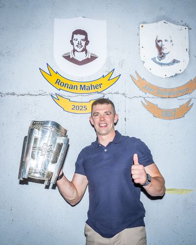 Ronan Maher with the Liam MacCarthy Cup at his club, Thurles Sarsfields, where his portrait has been added to the Wall of Legends dedicated to club players who captained Tipperary to an All-Ireland. Photograph: Thurles Sarsfields/X