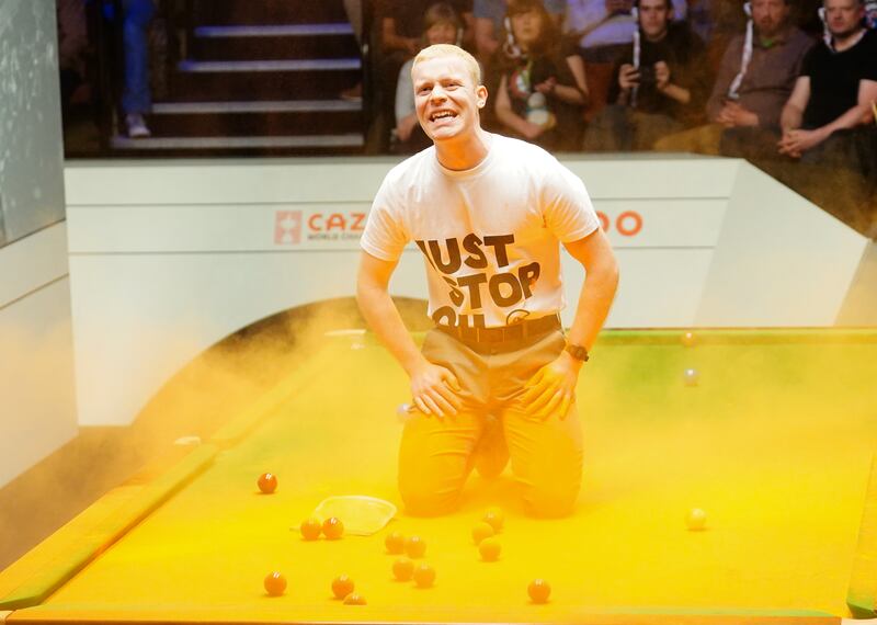 A Just Stop Oil protester disrupted a match at the World Snooker Championship at the Crucible in Sheffield on Monday. Photograph: Mike Egerton/PA