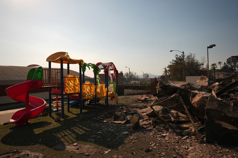 The disaster has destroyed entire homes with flames hitting churches, schools, a synagogue, libraries, bars and playgrounds. Photograph: Jae C Hong/AP