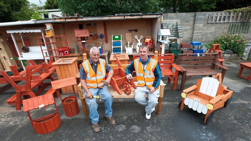 John Hennessy and Fran Shaw at the Men’s Shed in Mulhuddart: “It’s great to get out and work with the kids,” says Mr Shaw. Photograph: Dave Meehan
