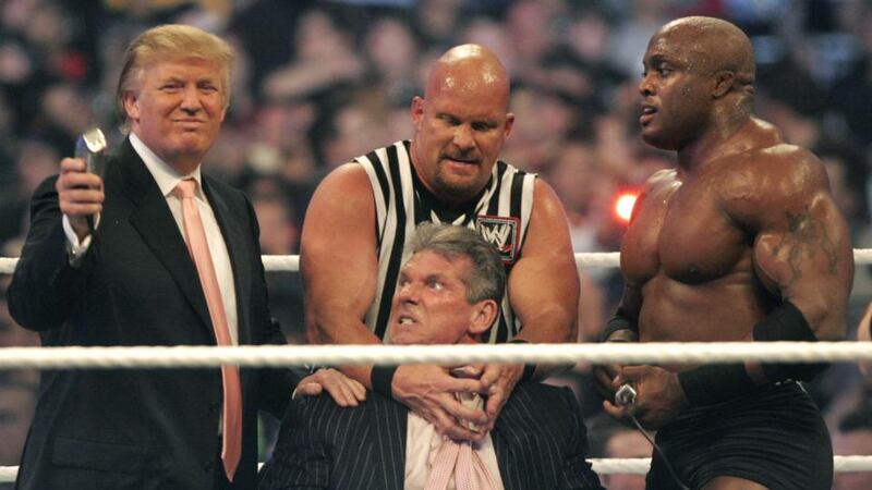 WWE chairman Vince McMahon prepares to have his head shaved by Donald Trump and Bobby Lashley while being held down by ‘’Stone Cold’’ Steve Austin after losing a bet in the Battle of the Billionaires at the 2007 WWE’s Wrestlemania at Ford Field in Detroit, Michigan. Photograph: Bill Pugliano/Getty