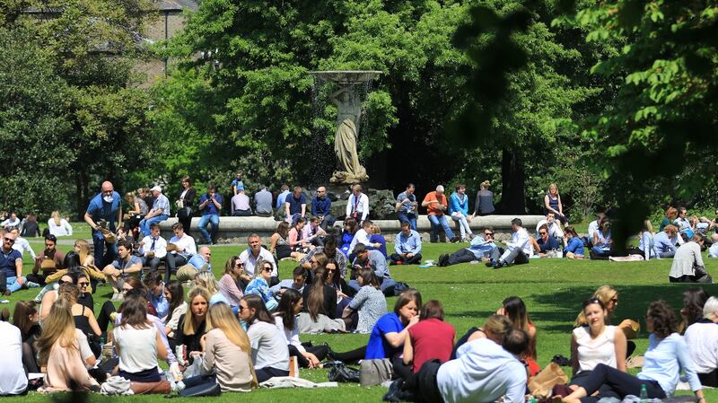 People enjoy  good weather in May at   theIveagh Gardens in Dublin. Photograph: The Irish Times