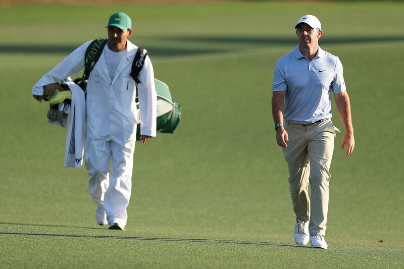 Rory McIlroy of Northern Ireland and his caddie Harry Diamond walk the 18th fairway during the final round of the 2026 Masters Tournament at Augusta National Golf Club on April 12, 2026 in Augusta, Georgia. Photograph: Andrew Redington/Getty Images