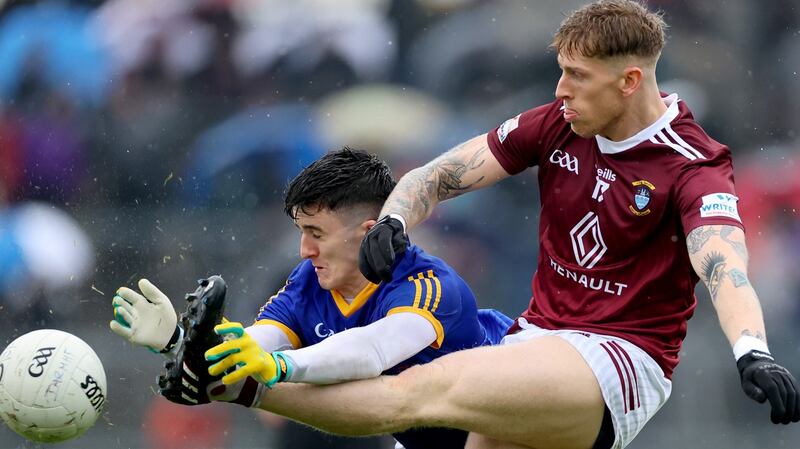 Longford’s Iarla O’Sullivan blocks  Luke Loughlin of Westmeath during the Leinster SFC quarter-final at  TEG Cusack Park in  Mullingar. Photograph: James Crombie/Inpho
