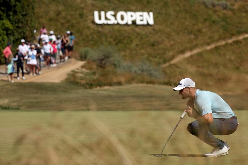 Wyndham Clark lines up a putt on the fourth green during the final round of the 123rd US Open Championship at The Los Angeles Country Club. Photograph: Harry How/Getty Images