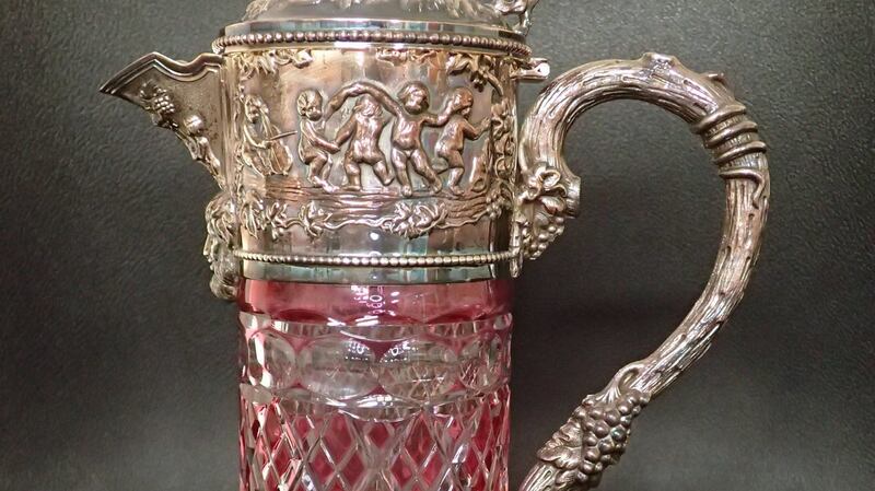 Pink glass silver-topped decanter achieved €540 (€80-€120) at John Weldon.