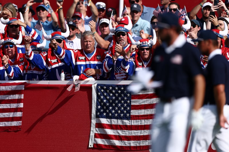 Fans cheer on the 14th tee during the Saturday morning foursomes at the Ryder Cup. Photograph: Maddie Meyer/Getty