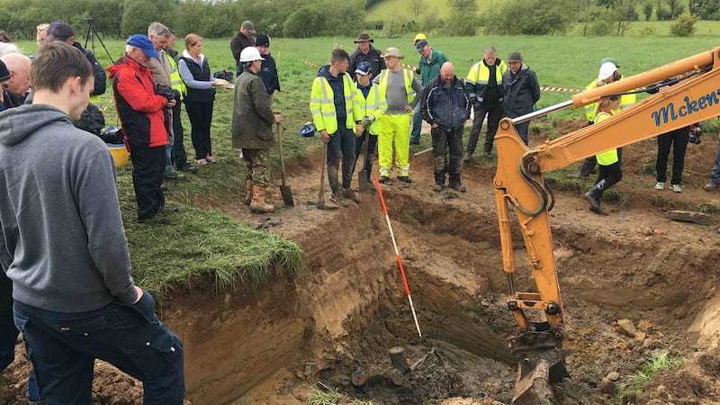 The remains of a British Spitfire fighter plane are removed from the Co Monaghan field  at Figullar, Emyvale,  where it was shot down during the second World War. Photograph: Dara Mac Dónaill/The Irish Times