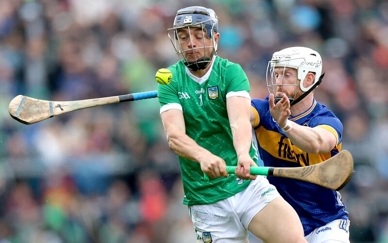 Limerick’s David Reidy battles with Michael Breen of Tipperary. Photograph: James Crombie/Inpho