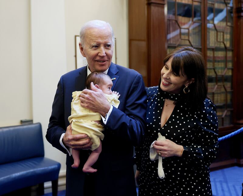 US president Joe Biden with Senator Rebecca Moynihan and her daughter Margot 
