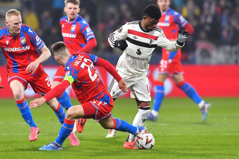 Manchester United's Amad Diallo and Plzen's Lukas Kalvach. Photograph: Michal Cizek/AFP via Getty Images