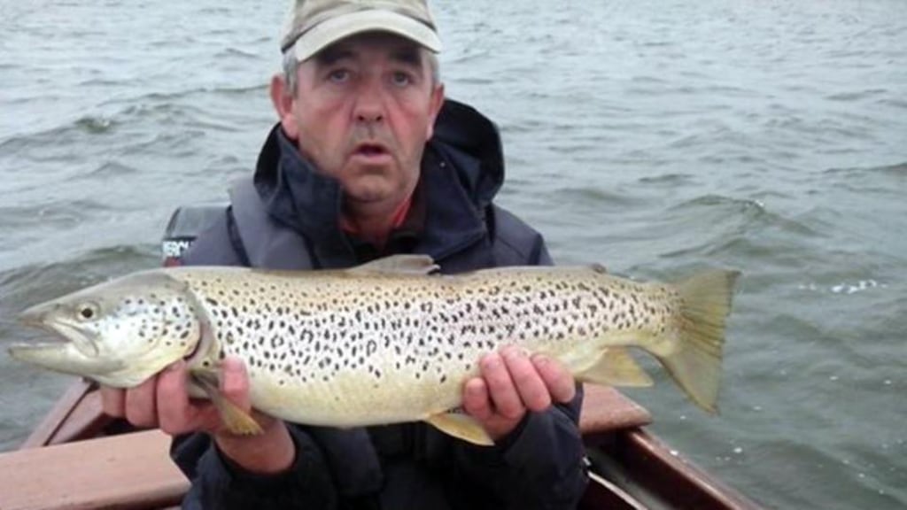 Ned Clinton holding a magnificent Sheelin trout of 4.3kg (9.5lb) caught by Michael Clancy, London, on a red tailed Green Peter last Sunday.