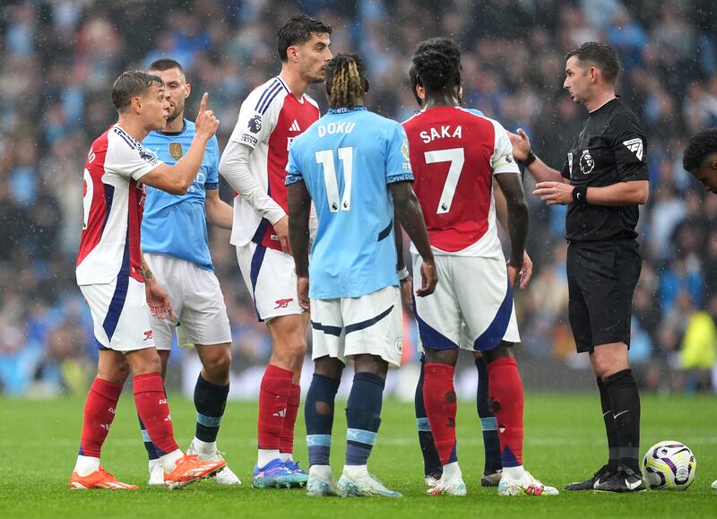 Leandro Trossard denies giving the referee a reason to give him another card during Arsenal's Premier League draw with Manchester City on Sunday. Martin Rickett/PA Wire