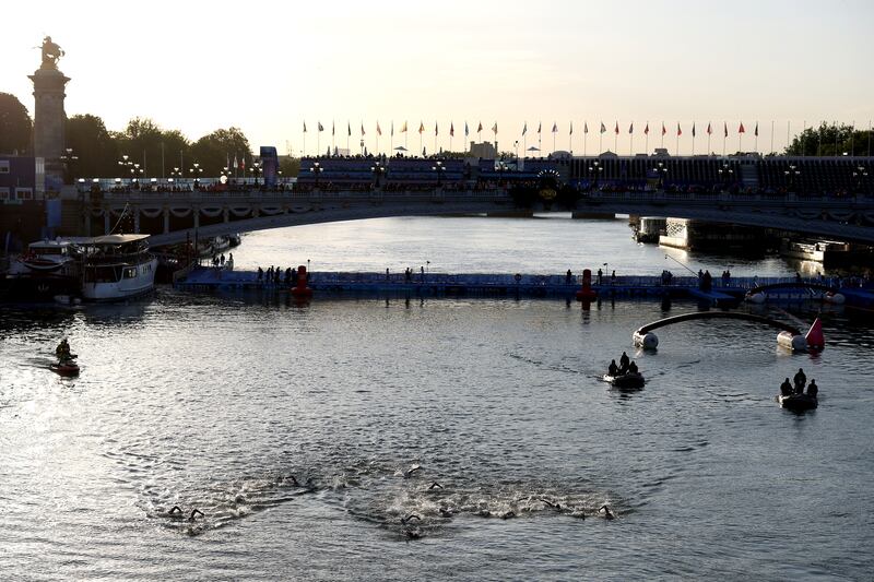 Swimmers in the women's 10km at Pont Alexandre III over the river Seine in Paris this morning. Photograph: Clive Rose/Getty Images