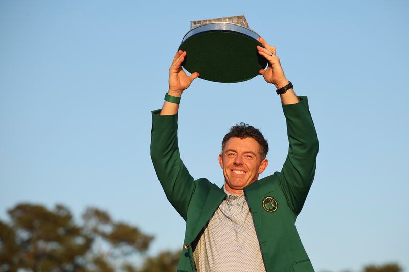 Rory McIlroy of Northern Ireland lifts the Masters trophy. Photograph: Hector Vivas/Getty