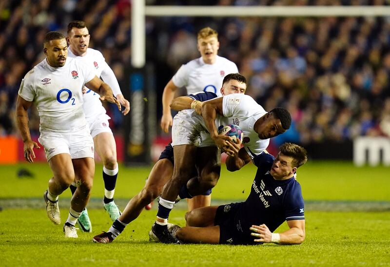 England's Immanuel Feyi-Waboso is tackled against Scotland. Photograph: Jane Barlow/PA Wire