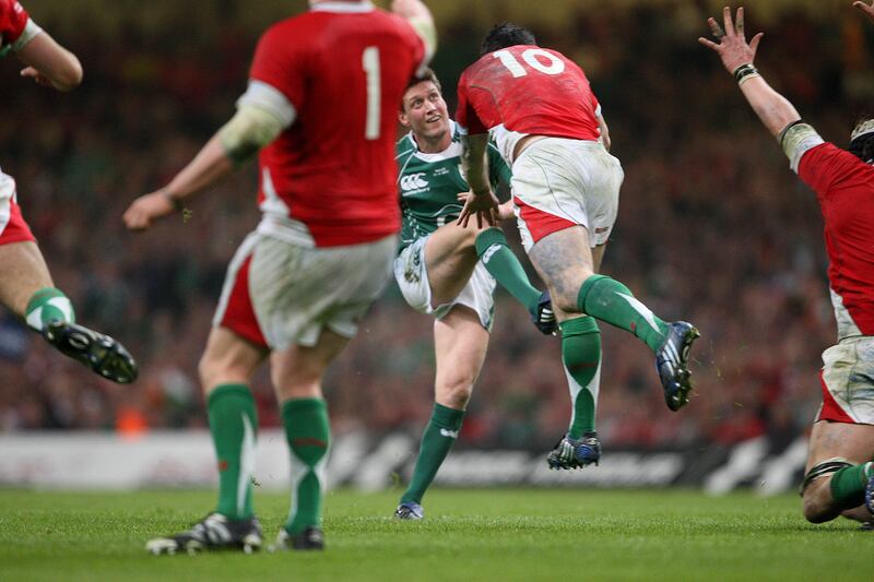 Ireland's Ronan O'Gara kicks the winning drop goal against Wales to win the Grand Slam in 2009. Photograph: Billy Stickland/Inpho