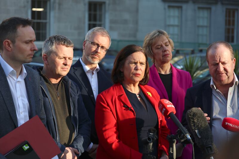 Sinn Féin leader Mary Lou McDonald with other members of the Opposition speaking to the media on the plinth at Leinster House on Tuesday evening. Photograph: Stephen Collins/Collins Photos
