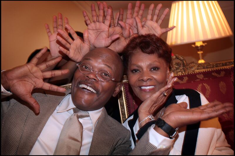 Actor Samual L .Jackson and singer Dionne Warwick in the American Ambassadors Residence in the Phoenix Park Dublin with members of the New York City based Soul Stepdance singers who were in Ireland for Irish American History month in 2010. Photograph: Brenda Fitzsimons/The Irish Times