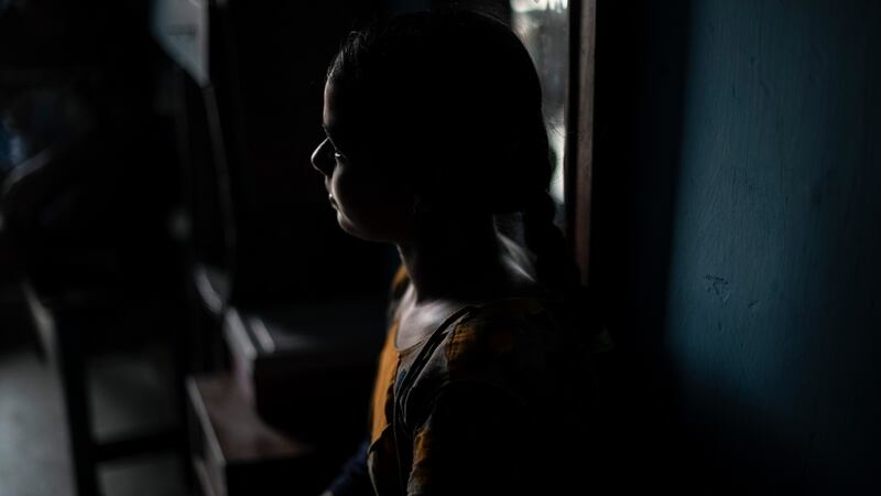 G Sonali Reddy (14) is her family’s caretaker,  after their parents died of Covid-19. Photograph: Rebecca Conway/ The New York Times