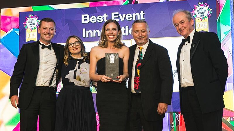 Peter Hanley, Director, Hanley Event Group presents the Best Event Innovation award to the Cogs & Marvel team.