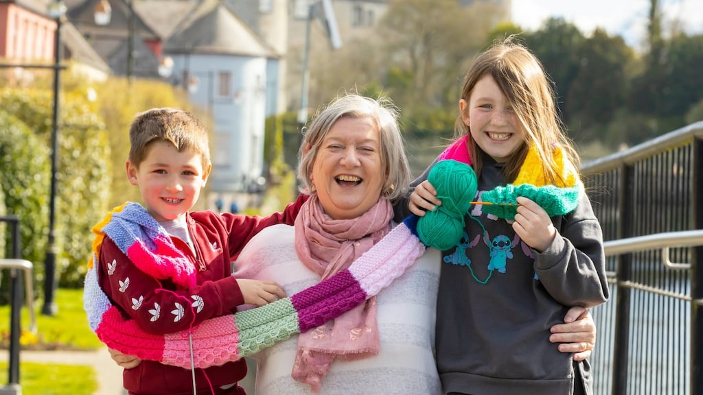 Monica Dunne from Kilkenny city with her grandchildren Billy (5) and Lucy Hayes (9) as they launch the  Knitted Together 3 project. Photograph: Patrick Browne