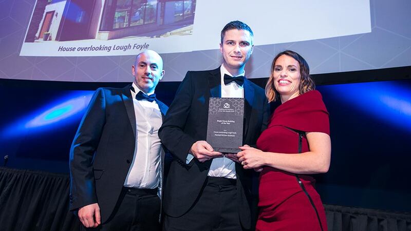 Derry Kearney, Awards Judge presents the Single House Building of the Year award to Martin Marshall & Roisin McCann, Marshall McCann Architects.