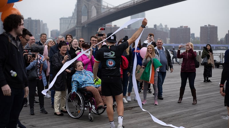 Mary Evans and Shane Finn at the finish-line in New York.