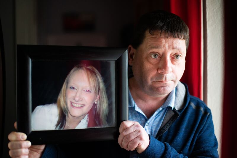 Ciara Ní Chathmhaoil in a photograph being held by her father, Micheál Cunningham, in 2007. Photograph: Tom Honan
