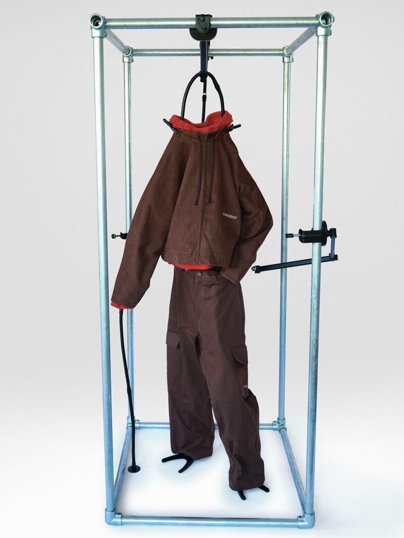 Robyn Lynch red polar fleece hoodie (€115), cropped cotton drill jacket (€225) and cotton drill cargo trouser (€175)