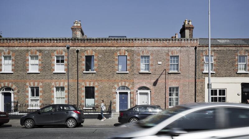On the front elevation, new full-size windows were inserted into existing window openings with secondary frames concealed behind the brickwork.