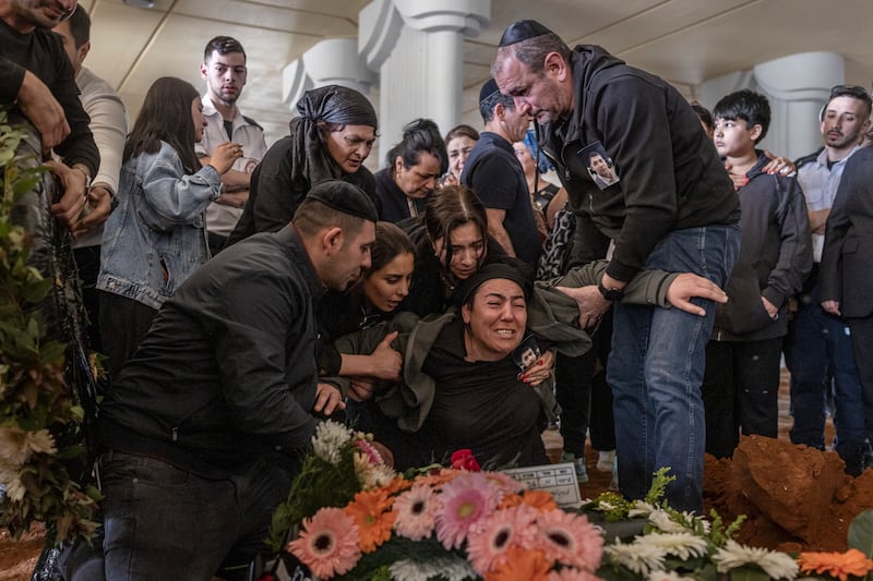 Mourners at the funeral of Amid Murtuzov in Petah Tikva, Israel, March 11th, 2026. Murtuzov was wounded in an Iranian cluster bomb missile strike in central Israel, and died from his injuries the following day. Photograph: Avishag Shaar-Yashuv/The New York Times